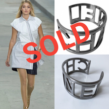 Load image into Gallery viewer, Chanel 15P 2015 Spring Block Letters Cuff Letter Bracelet Bangle